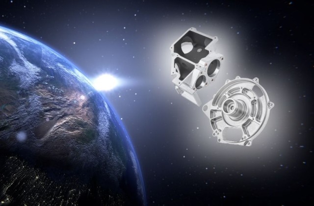 Technische Bauteile der mechanischen Fertigungstechnik schweben im Weltall nebne einer Erdkugel hinter der ein helles Licht leuchtet